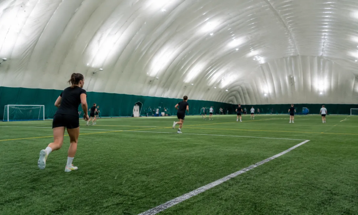 Indoor training session inside an inflatable sports dome
